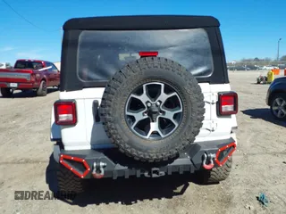 2023 Jeep Wrangler Rubicon with VIN 1C4HJXFG8PW655138, listed as a IAAI auction lot 41674959 with 40,790 mi miles and . Bid and sale history available at DreamBid. Image 16.