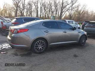 2013 Kia Optima LX with VIN 5XXGM4A77DG166140, listed as a IAAI auction lot 41881144 with 185,391 mi miles. Bid and sale history available at carsss.com. Image 13.