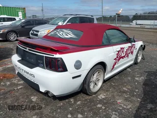 2002 Ford Mustang GT Deluxe z VIN 1FAFP45X62F165902, wystawiony jako IAAI lot #41814507 z przebiegiem 129 528 mil mil oraz . Historia ofert i sprzedaży dostępna na DreamBid. Obrazek 4.