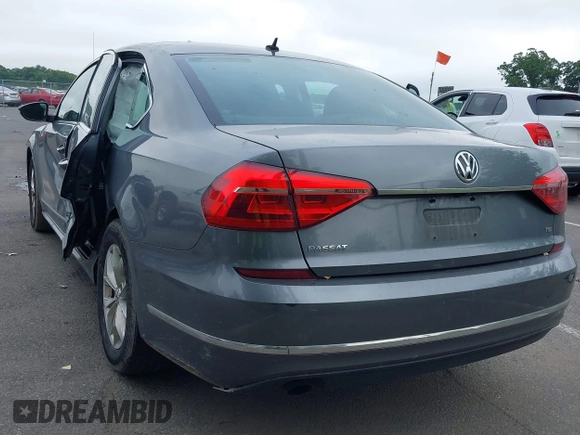 2016 Volkswagen Passat S with VIN 1VWAT7A30GC054210, listed as a IAAI auction lot 42452304 with 119,842 mi miles and . Bid and sale history available at DreamBid. Image 3.