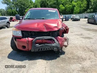 2015 Nissan Titan Pro-4X with VIN 1N6BA0EC5FN506358, listed as a Copart auction lot 56671205 with 153,712 mi miles and Salvage title. Bid and sale history available at DreamBid. Image 14.