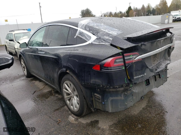 2018 Tesla Model X 75D with VIN 5YJXCBE20JF119875, listed as a Copart auction lot 50772175 with 48,805 mi miles and Salvage Title. Bid and sale history available at carsss.com. Image 2.