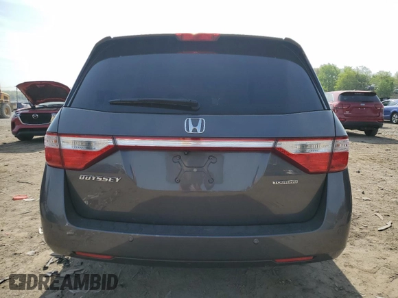 2012 Honda Odyssey Touring with VIN 5FNRL5H92CB134917, listed as a Copart auction lot 54437875 with 139,318 mi miles and Salvage Title. Bid and sale history available at DreamBid. Image 6.