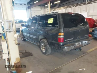 2004 Chevrolet Suburban LT z VIN 1GNFK16Z64J268977, wystawiony jako IAAI lot #41573029 z przebiegiem 181 923 mil mil oraz . Historia ofert i sprzedaży dostępna na DreamBid. Obrazek 3.