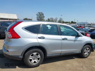 2015 Honda CR-V LX with VIN 3CZRM3H37FG706005, listed as a IAAI auction lot 41968907 with 107,690 mi miles and . Bid and sale history available at carsss.com. Image 14.