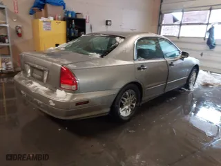 2002 Mitsubishi Diamante LS with VIN 6MMAP67P32T005867, listed as a IAAI auction lot 41586460 with 390,586 mi miles. Bid and sale history available at carsss.com. Image 4.