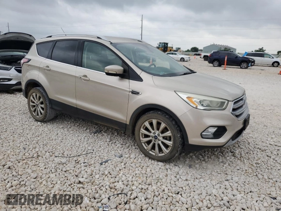 2017 Ford Escape Titanium with VIN 1FMCU0J95HUD40629, listed as a Copart auction lot 54982545 with 206,891 mi miles and Clean Title. Bid and sale history available at DreamBid. Image 4.