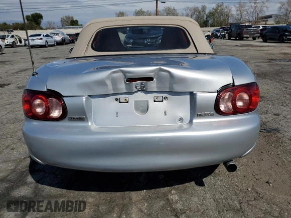 2003 Mazda MX-5 Miata Cloth z VIN JM1NB353430301685, wystawiony jako Copart lot #48756715 z przebiegiem 57 414 mil mil oraz Szkoda całkowita • Salvage title. Historia ofert i sprzedaży dostępna na DreamBid. Obrazek 6.