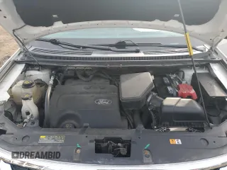 2013 Ford Edge SEL z VIN 2FMDK4JCXDBA38217, wystawiony jako Copart lot #58256755 z przebiegiem 151 551 mil mil oraz Szkoda całkowita • Salvage title. Historia ofert i sprzedaży dostępna na DreamBid. Obrazek 11.