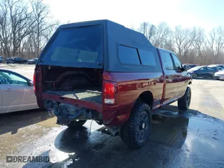 2016 Ram 2500 Laramie with VIN 3C6UR5FL7GG368646, listed as a IAAI auction lot 41649574 with 302,360 mi miles. Bid and sale history available at carsss.com. Image 4.