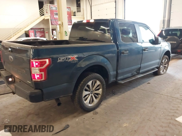 2018 Ford F-150 XL with VIN 1FTEW1EPXJKE93689, listed as a IAAI auction lot 41710693 with 117,065 mi miles. Bid and sale history available at carsss.com. Image 4.