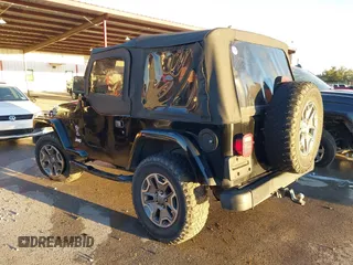 1997 Jeep Wrangler SE with VIN 1J4FY29P0VP415195, listed as a IAAI auction lot 41221078 with 137,046 mi miles. Bid and sale history available at carsss.com. Image 3.