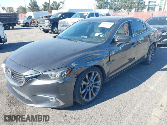 2017 Mazda 6 Grand Touring with VIN JM1GL1W51H1137470, listed as a IAAI auction lot 41872756 with 132,564 mi miles. Bid and sale history available at carsss.com. Image 18.