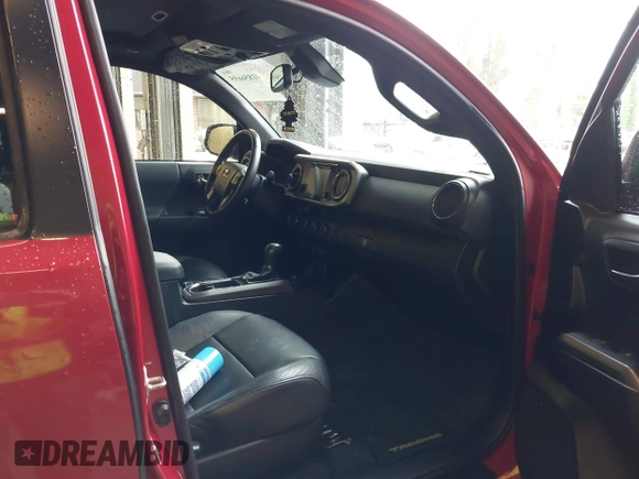 2019 Toyota Tacoma SR z VIN 3TMCZ5AN5KM220079, wystawiony jako IAAI lot #41856695 z przebiegiem 51 918 mil mil oraz . Historia ofert i sprzedaży dostępna na DreamBid. Obrazek 5.
