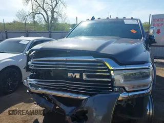 2020 Ram 2500 Laramie z VIN 3C6UR5FL0LG230960, wystawiony jako IAAI lot #42029886 z przebiegiem 61 544 mil mil oraz . Historia ofert i sprzedaży dostępna na DreamBid. Obrazek 11.