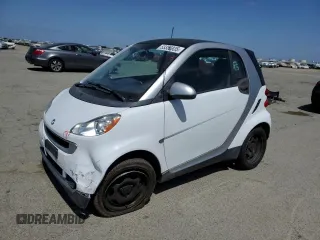 2012 Smart fortwo Pure z VIN WMEEJ3BA9CK561933, wystawiony jako Copart lot #53356835 z przebiegiem 67 587 mil mil oraz Nie do naprawy • Non repairable. Historia ofert i sprzedaży dostępna na DreamBid. Obrazek 1.