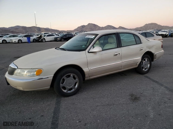 2000 Lincoln Continental with VIN 1LNHM97V0YY807253, listed as a Copart auction lot 80661834 with 130,398 mi miles and Salvage Title. Bid and sale history available at carsss.com. Image 1.