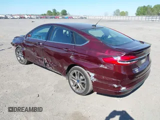2017 Ford Fusion SE z VIN 3FA6P0H70HR198507, wystawiony jako IAAI lot #42033338 z przebiegiem 94 363 mil mil oraz . Historia ofert i sprzedaży dostępna na DreamBid. Obrazek 3.
