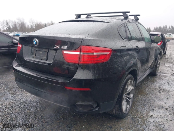 2014 BMW X6 50i with VIN 5UXFG8C57EL593257, listed as a IAAI auction lot 41655486 with 128,292 mi miles. Bid and sale history available at carsss.com. Image 4.