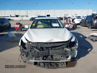 2014 Infiniti Q50 z VIN JN1BV7AP2EM681053, wystawiony jako IAAI lot #41395566 z przebiegiem 230 055 mil mil oraz . Historia ofert i sprzedaży dostępna na DreamBid. Obrazek 13.
