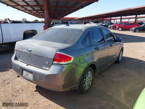 2009 Ford Focus SE with VIN 1FAHP35N79W166875, listed as a IAAI auction lot 41506700 with 174,061 mi miles. Bid and sale history available at carsss.com. Image 4.