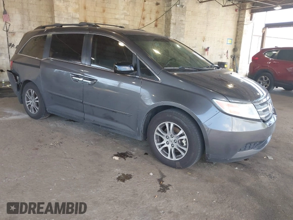 2012 Honda Odyssey EX-L with VIN 5FNRL5H67CB016934, listed as a IAAI auction lot 42405714 with 248,512 mi miles and . Bid and sale history available at DreamBid. Image 1.