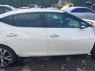 2017 Nissan Maxima Platinum with VIN 1N4AA6AP1HC403792, listed as a IAAI auction lot 42436500 with 174,069 mi miles and . Bid and sale history available at DreamBid. Image 14.