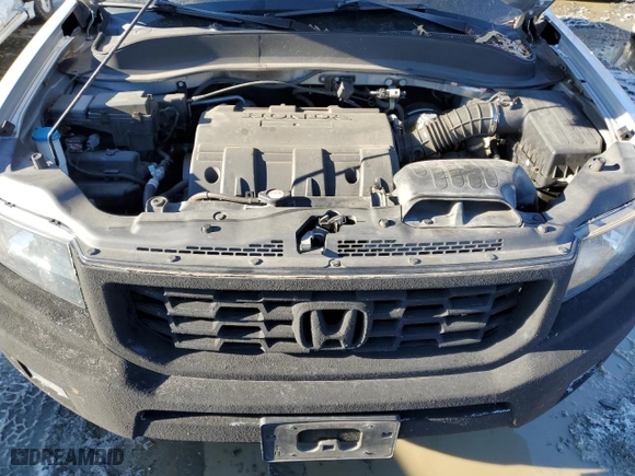 2014 Honda Ridgeline SE with VIN 5FPYK1F63EB014506, listed as a Copart auction lot 41698255 with 100,828 mi miles and Salvage Title. Bid and sale history available at carsss.com. Image 11.