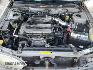 1999 Infiniti G20 z VIN JNKCP11A7XT020372, wystawiony jako Copart lot #73639514 z przebiegiem 174 467 mil mil oraz Szkody całkowita. Historia ofert i sprzedaży dostępna na DreamBid. Obrazek 11.