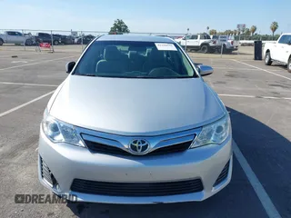 2014 Toyota Camry L with VIN 4T4BF1FK5ER442960, listed as a IAAI auction lot 42206639 with 119,639 mi miles and . Bid and sale history available at DreamBid. Image 12.