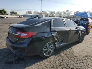 2021 Honda Clarity with VIN JHMZC5F13MC001142, listed as a Copart auction lot 65222432 with 60,968 mi miles. Bid and sale history available at carsss.com. Image 4.
