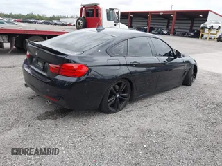 2015 BMW 4 Series 435i with VIN WBA4B1C5XFD955119, listed as a IAAI auction lot 41349918 with 181,937 mi miles and . Bid and sale history available at carsss.com. Image 4.