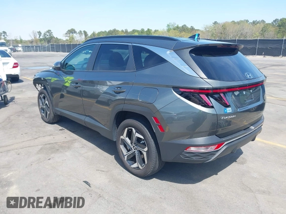2022 Hyundai Tucson SEL z VIN 5NMJCCAE4NH096813, wystawiony jako IAAI lot #41899641 z przebiegiem 23 668 mil mil oraz . Historia ofert i sprzedaży dostępna na DreamBid. Obrazek 3.