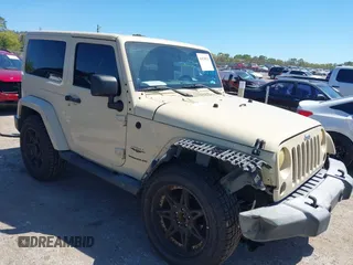 2011 Jeep Wrangler Sahara with VIN 1J4AA5D13BL562732, listed as a IAAI auction lot 41838520 with 148,359 mi miles and . Bid and sale history available at carsss.com. Image 1.