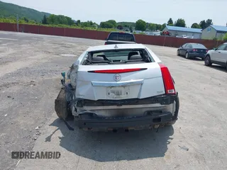 2014 Cadillac CTS Performance with VIN 1G6DG1E35E0107139, listed as a IAAI auction lot 42371034 with 56,988 mi miles and . Bid and sale history available at DreamBid. Image 17.
