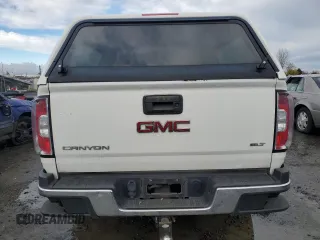 2016 GMC Canyon 4WD SLT with VIN 1GTP6DE11G1266217, listed as a Copart auction lot 82195694 with 129,578 mi miles and Clean Title. Bid and sale history available at carsss.com. Image 6.