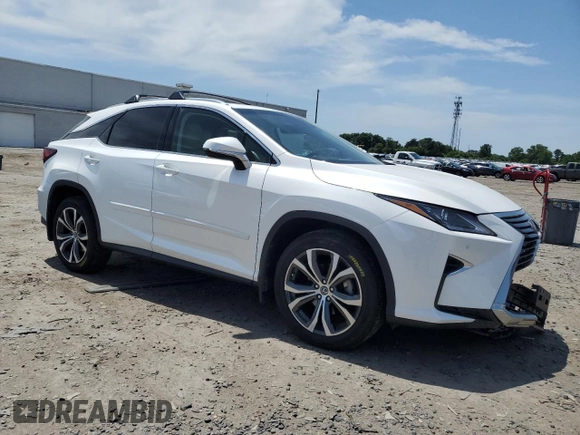 2018 Lexus RX 350 z VIN 2T2BZMCA5JC144799, wystawiony jako Copart lot #57553445 z przebiegiem 59 682 mil mil oraz Szkoda całkowita • Salvage title. Historia ofert i sprzedaży dostępna na DreamBid. Obrazek 4.