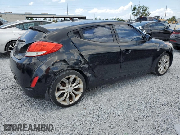 2013 Hyundai Veloster w/Black Int z VIN KMHTC6ADXDU157196, wystawiony jako Copart lot #58091015 z przebiegiem 136 201 mil mil oraz Szkoda całkowita • Salvage title. Historia ofert i sprzedaży dostępna na DreamBid. Obrazek 3.
