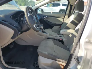 2013 Ford Focus SE with VIN 1FADP3F20DL142026, listed as a Copart auction lot 61855025 with 148,851 mi miles and Salvage title. Bid and sale history available at DreamBid. Image 7.