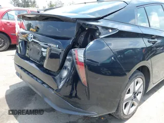 2017 Toyota Prius Two with VIN JTDKARFUXH3041668, listed as a IAAI auction lot 42421754 with 57,677 mi miles and . Bid and sale history available at DreamBid. Image 6.