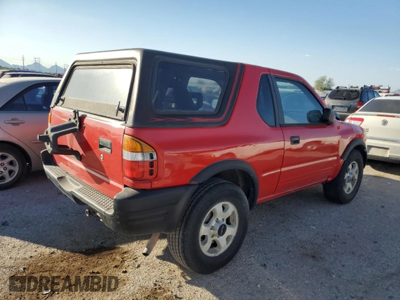 1999 Isuzu Rodeo z VIN 4S2CK57W3X4301044, wystawiony jako Copart lot #75758024 z przebiegiem 209 456 mil mil oraz Czysty tytuł • Clean title. Historia ofert i sprzedaży dostępna na DreamBid. Obrazek 3.