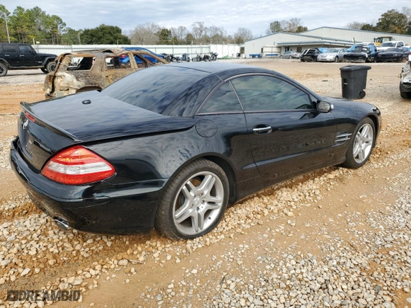 2007 Mercedes-Benz SL-Class 5.5L V8 with VIN WDBSK71F57F130540, listed as a Copart auction lot 43042515 with 82,744 mi miles and Salvage Title. Bid and sale history available at carsss.com. Image 3.