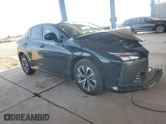 2023 Lexus RZ with VIN JTJAAAAB0PA015963, listed as a Copart auction lot 64261624 with 14,913 mi miles and Salvage Title. Bid and sale history available at carsss.com. Image 4.