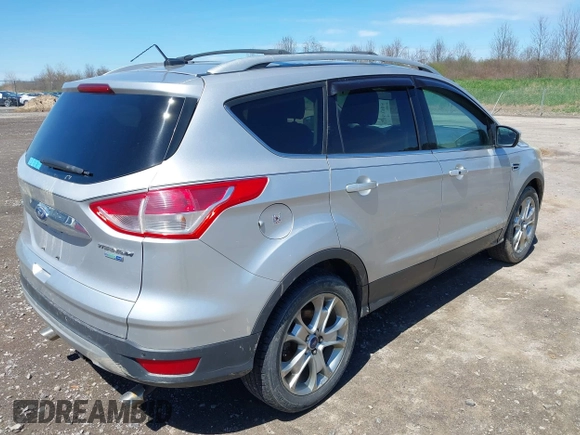 2016 Ford Escape Titanium with VIN 1FMCU9JX6GUB80715, listed as a IAAI auction lot 42060305 with 132,951 mi miles and . Bid and sale history available at DreamBid. Image 4.