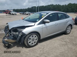 2012 Ford Focus SE with VIN 1FAHP3F23CL387256, listed as a Copart auction lot 62645865 with 104,021 mi miles and Salvage title. Bid and sale history available at DreamBid. Image 1.