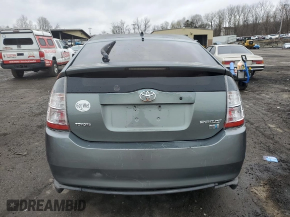 2004 Toyota Prius z VIN JTDKB20U640016341, wystawiony jako Copart lot #52828115 z przebiegiem 53 551 mil mil oraz Czysty tytuł • Clean title. Historia ofert i sprzedaży dostępna na DreamBid. Obrazek 6.