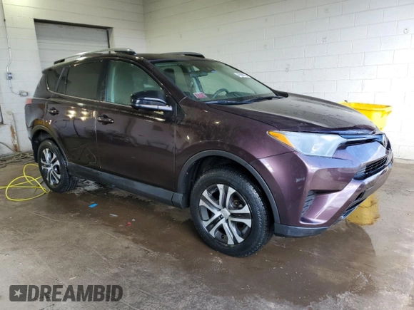 2018 Toyota RAV4 LE with VIN 2T3BFREV2JW724060, listed as a Copart auction lot 49888915 with 49,311 mi miles and Salvage Title. Bid and sale history available at DreamBid. Image 4.