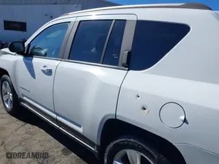 2016 Jeep Compass Sport with VIN 1C4NJDBB0GD617720, listed as a IAAI auction lot 41854195 with 97,961 mi miles. Bid and sale history available at carsss.com. Image 14.
