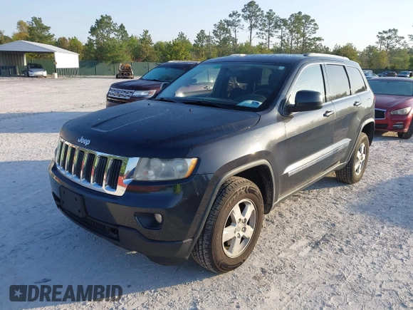 2012 Jeep Grand Cherokee Laredo with VIN 1C4RJFAG5CC234382, listed as a IAAI auction lot 42010153 with 185,078 mi miles. Bid and sale history available at carsss.com. Image 2.