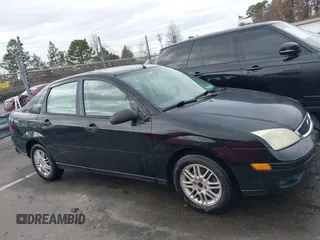 2005 Ford Focus S with VIN 1FAFP34N75W304479, listed as a IAAI auction lot 41117405 with 234,312 mi miles. Bid and sale history available at carsss.com. Image 13.